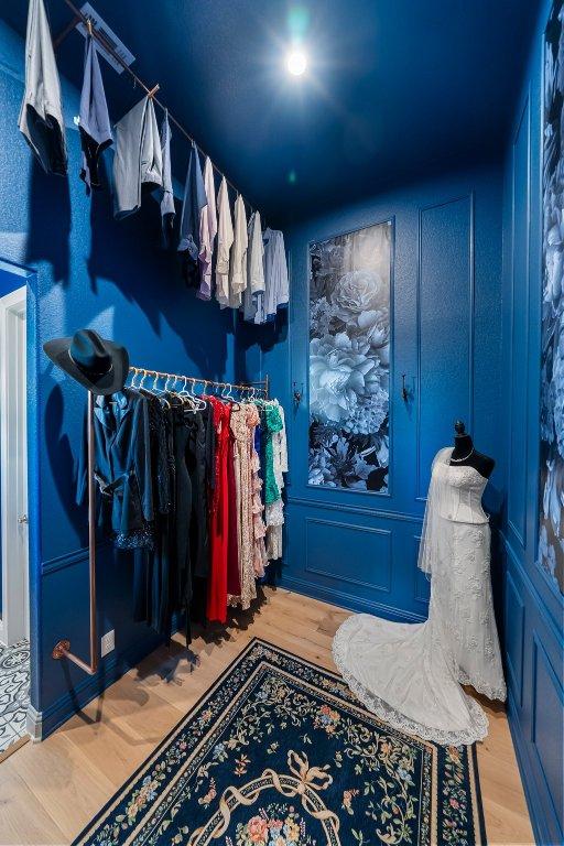 4509 Port Bari Dr, Leander, TX 78641 - walk in closet with wood finished floors