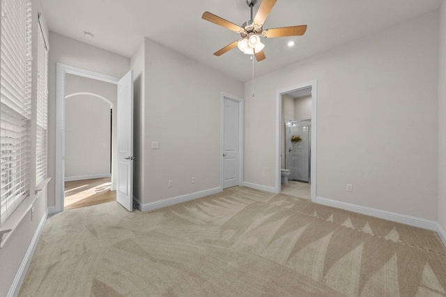 4509 Port Bari Dr, Leander, TX 78641 - unfurnished bedroom with carpet, connected bathroom, recessed lighting, and a ceiling fan