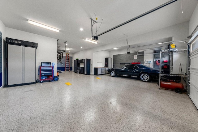 4509 Port Bari Dr, Leander, TX 78641 - garage featuring a garage door opener