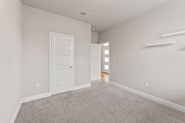 16941 Aventura Ave, Pflugerville, TX 78660 - unfurnished bedroom featuring carpet floors and baseboards