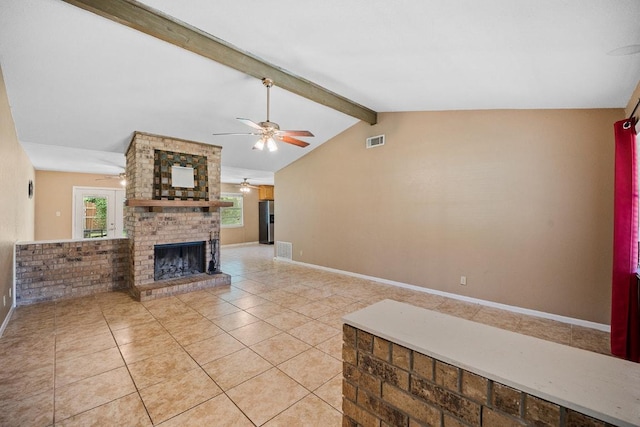 206 Woodland Trl, Belton, TX 76513 - unfurnished living room featuring ceiling fan, a brick fireplace, and light tile patterned flooring