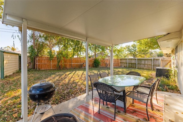 206 Woodland Trl, Belton, TX 76513 - fenced backyard with outdoor dining area and a patio