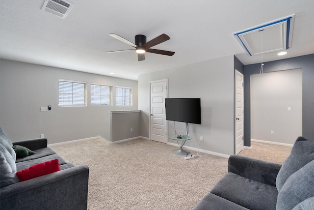 12003 Curlin Cv, Buda, TX 78610 - living room with attic access, a ceiling fan, and light colored carpet