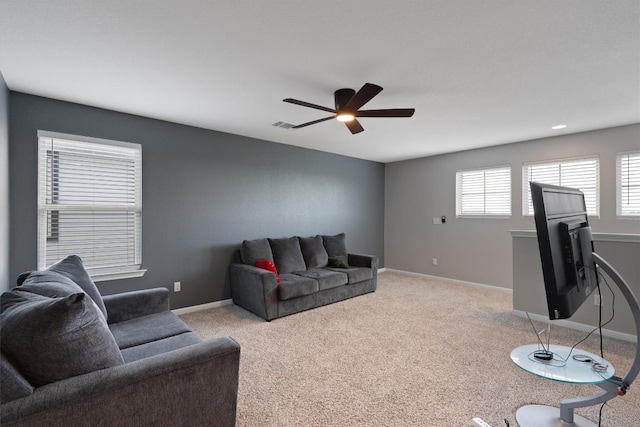 12003 Curlin Cv, Buda, TX 78610 - living room featuring a ceiling fan and light carpet