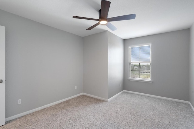 12003 Curlin Cv, Buda, TX 78610 - unfurnished room with light colored carpet and ceiling fan