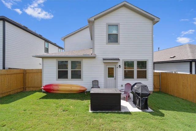 12003 Curlin Cv, Buda, TX 78610 - rear view of property with a fenced backyard and a patio area