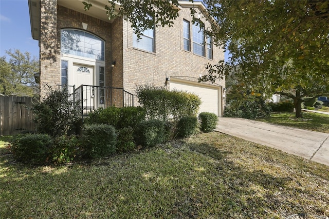 9405 Billingham Trl, Austin, TX 78717 - view of front of home featuring brick siding, driveway, and an attached garage
