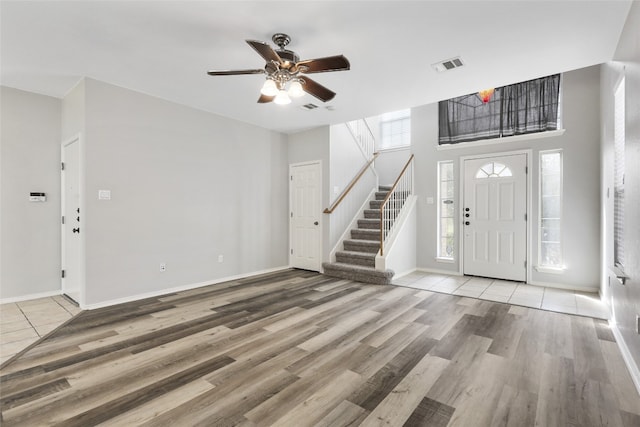 9405 Billingham Trl, Austin, TX 78717 - entrance foyer with stairs, wood finished floors, and ceiling fan