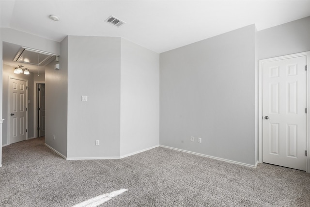 9405 Billingham Trl, Austin, TX 78717 - carpeted spare room with attic access and a smoke detector