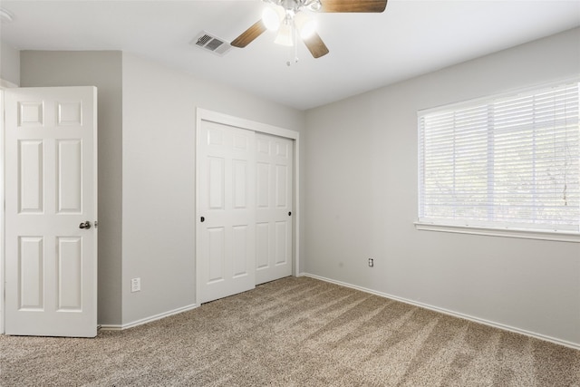 9405 Billingham Trl, Austin, TX 78717 - unfurnished bedroom with carpet, a closet, and a ceiling fan