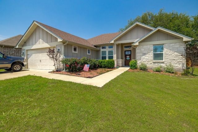 198 Sheridan Loop, Belton, TX 76513 - view of front of home with board and batten siding, an attached garage, a front lawn, and driveway