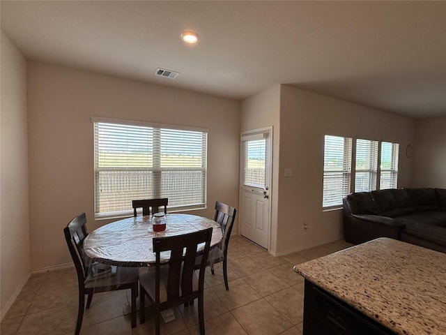 352 Circle Way Unit 37E, Jarrell, TX 76537 - dining space with light tile patterned floors and baseboards