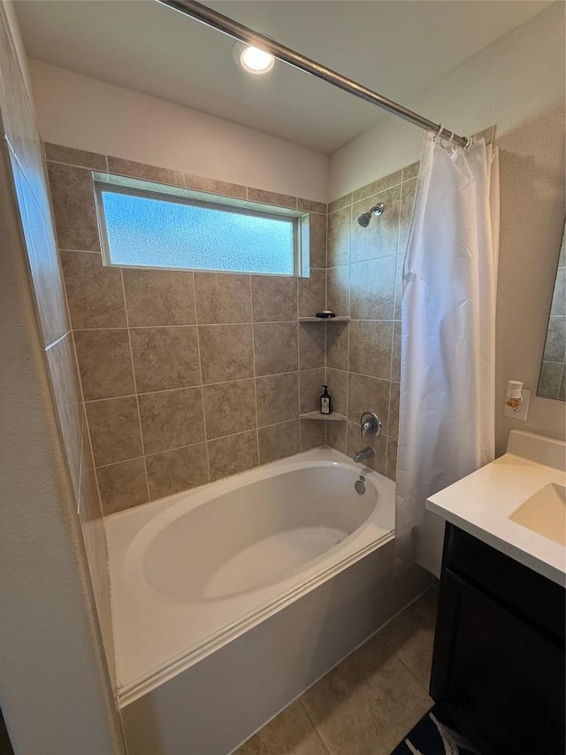 352 Circle Way Unit 37E, Jarrell, TX 76537 - bathroom featuring shower / bathtub combination with curtain, vanity, and tile patterned floors