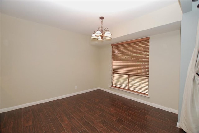 11724 Running Fox Trl, Austin, TX 78759 - unfurnished room featuring a chandelier and dark wood-style flooring