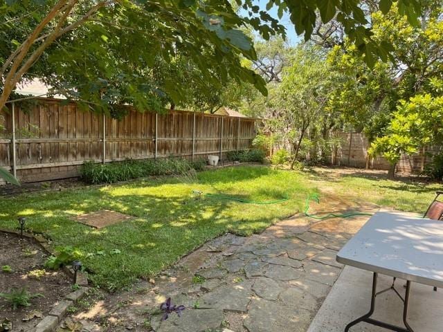11724 Running Fox Trl, Austin, TX 78759 - fenced backyard with a patio