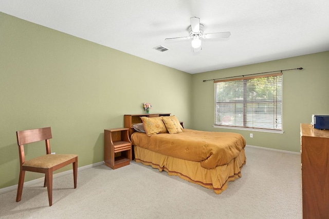 2127 Redwing Way, Round Rock, TX 78664 - carpeted bedroom with baseboards and a ceiling fan