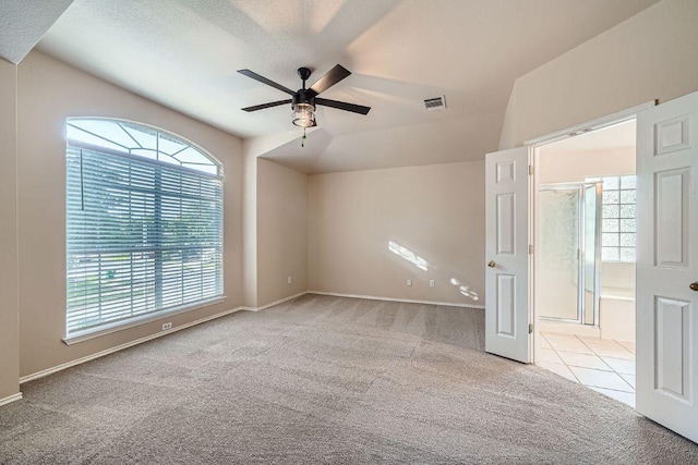 17714 Limpia Crk, Round Rock, TX 78664 - spare room with carpet flooring, ceiling fan, and lofted ceiling
