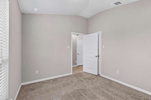 12301 Amber Lynn Path, Manor, TX 78653 - carpeted spare room with lofted ceiling and baseboards