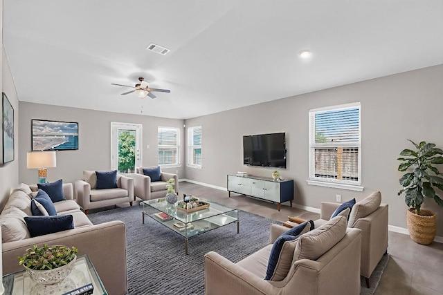 12301 Amber Lynn Path, Manor, TX 78653 - living area with a ceiling fan and baseboards