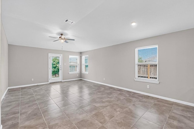 12301 Amber Lynn Path, Manor, TX 78653 - spare room featuring plenty of natural light, a ceiling fan, tile patterned floors, and recessed lighting