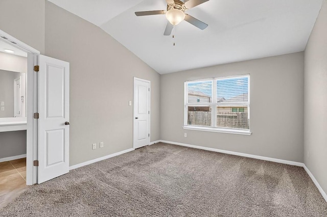 12301 Amber Lynn Path, Manor, TX 78653 - unfurnished bedroom with vaulted ceiling, carpet floors, and a ceiling fan