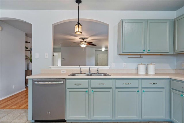 2102 Garrison Dr, Leander, TX 78641 - kitchen with dishwasher, a ceiling fan, pendant lighting, light countertops, and a peninsula