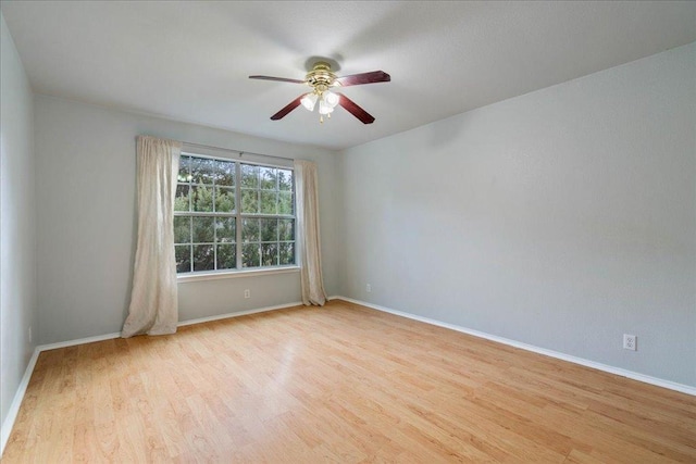 2102 Garrison Dr, Leander, TX 78641 - unfurnished room featuring wood finished floors and ceiling fan