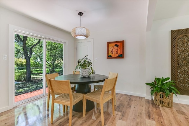 7806 Mullen Dr, Austin, TX 78757 - dining area with light wood-style floors and baseboards