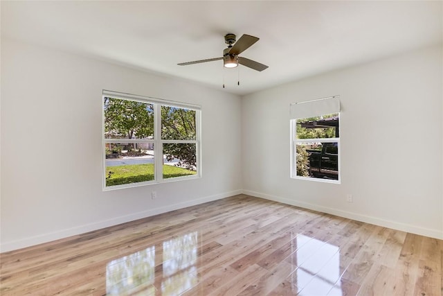 7806 Mullen Dr, Austin, TX 78757 - unfurnished room with light wood finished floors and ceiling fan