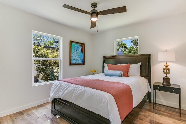 7806 Mullen Dr, Austin, TX 78757 - bedroom with wood finished floors and ceiling fan