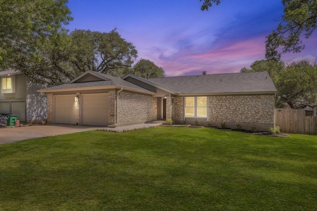 13101 Silver Creek Dr, Austin, TX 78727 - ranch-style house featuring stone siding, concrete driveway, an attached garage, and a shingled roof