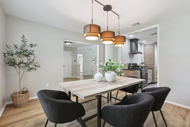 13101 Silver Creek Dr, Austin, TX 78727 - dining space with light wood finished floors and baseboards