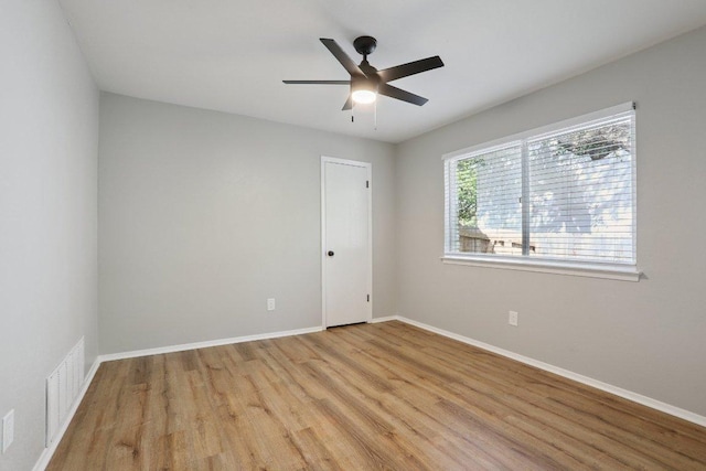 13101 Silver Creek Dr, Austin, TX 78727 - empty room featuring light wood finished floors and ceiling fan