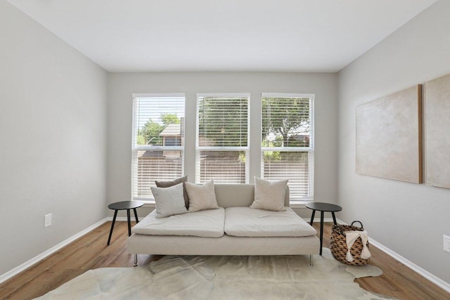 13101 Silver Creek Dr, Austin, TX 78727 - sitting room featuring plenty of natural light and wood finished floors