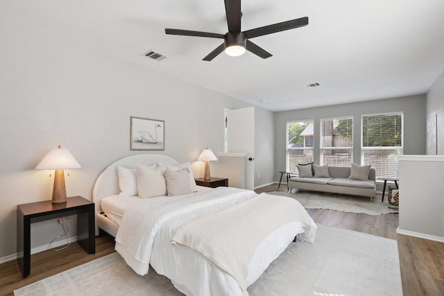 13101 Silver Creek Dr, Austin, TX 78727 - bedroom featuring wood finished floors and ceiling fan