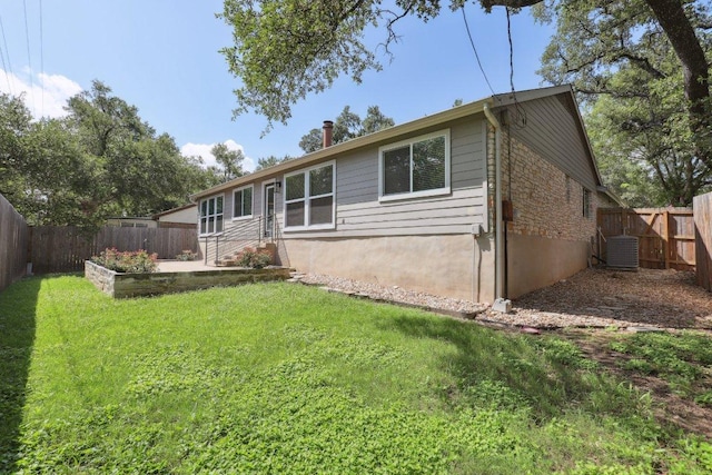 13101 Silver Creek Dr, Austin, TX 78727 - rear view of property featuring a fenced backyard