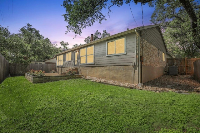 13101 Silver Creek Dr, Austin, TX 78727 - rear view of property with a fenced backyard