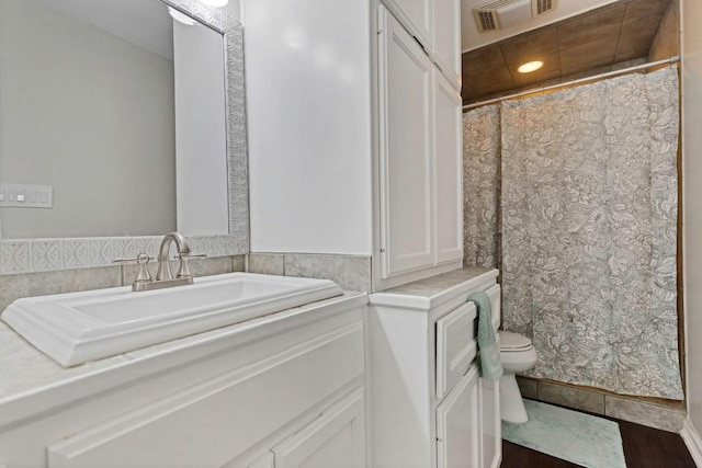 4001 Greystone Dr, Austin, TX 78731 - full bathroom featuring vanity, tile walls, and a shower with curtain