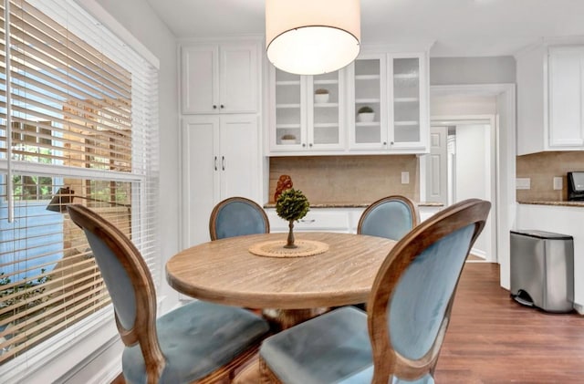 4001 Greystone Dr, Austin, TX 78731 - dining space featuring wood finished floors