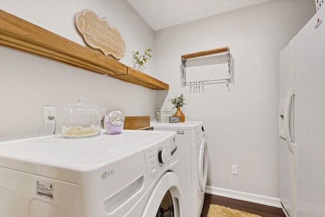4001 Greystone Dr, Austin, TX 78731 - washroom featuring washer and clothes dryer and dark wood-style flooring