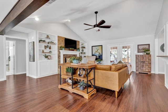 4001 Greystone Dr, Austin, TX 78731 - living room featuring a fireplace, french doors, ceiling fan, lofted ceiling, and built in features