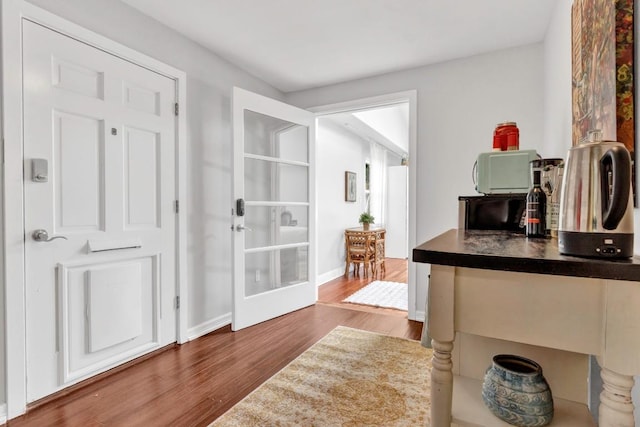 4001 Greystone Dr, Austin, TX 78731 - entryway featuring wood finished floors and french doors