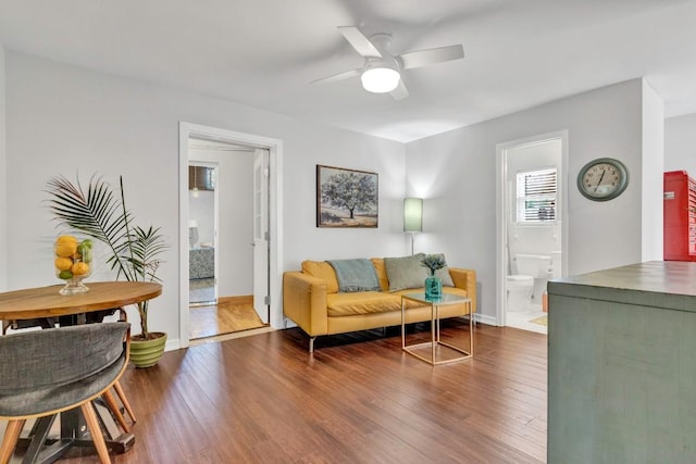 4001 Greystone Dr, Austin, TX 78731 - living area with a ceiling fan and wood finished floors