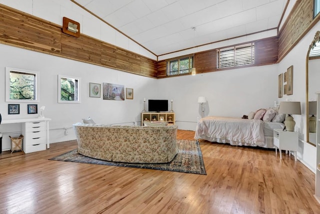 4001 Greystone Dr, Austin, TX 78731 - living area featuring a high ceiling and hardwood / wood-style flooring