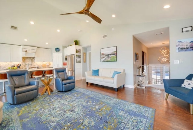 136 Web Isle Dr, Granite Shoals, TX 78654 - living room with wood finished floors, a ceiling fan, a chandelier, recessed lighting, and high vaulted ceiling