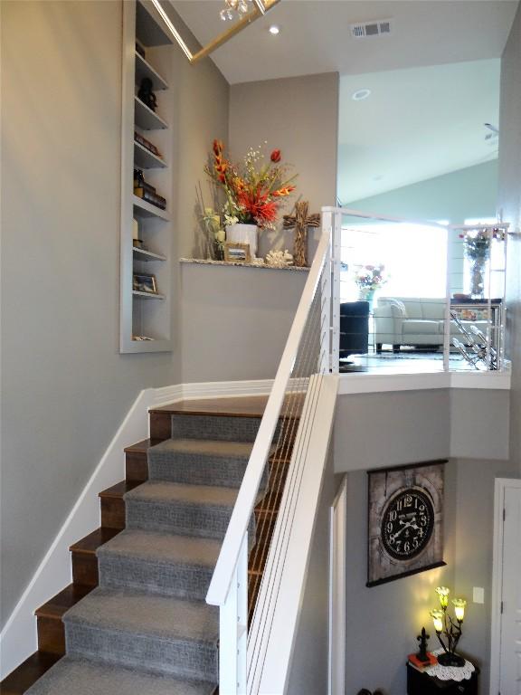 136 Web Isle Dr, Granite Shoals, TX 78654 - staircase with lofted ceiling and recessed lighting