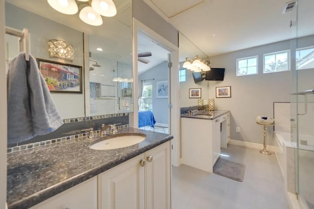 136 Web Isle Dr, Granite Shoals, TX 78654 - full bath featuring a shower stall, two vanities, a garden tub, and lofted ceiling