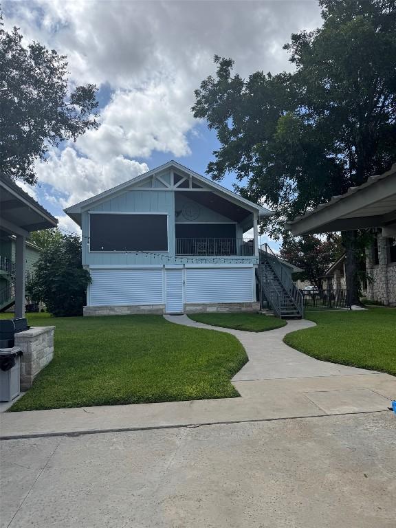 136 Web Isle Dr, Granite Shoals, TX 78654 - view of front of home with a front yard and stairway