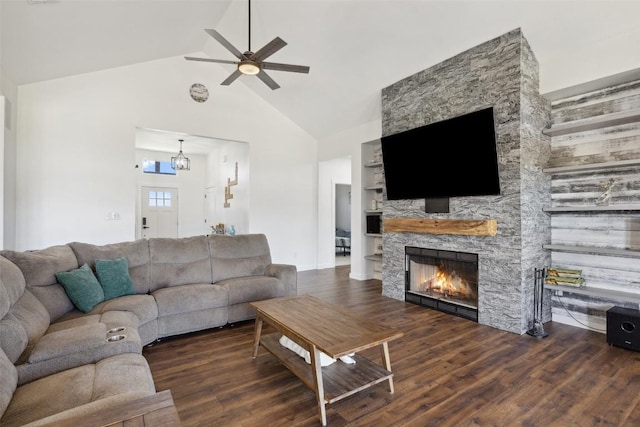 105 Mesa Grande Ct, Marble Falls, TX 78654 - living area featuring a ceiling fan, wood finished floors, a fireplace, high vaulted ceiling, and built in features