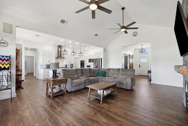 105 Mesa Grande Ct, Marble Falls, TX 78654 - living room featuring ceiling fan, high vaulted ceiling, and dark wood-style flooring